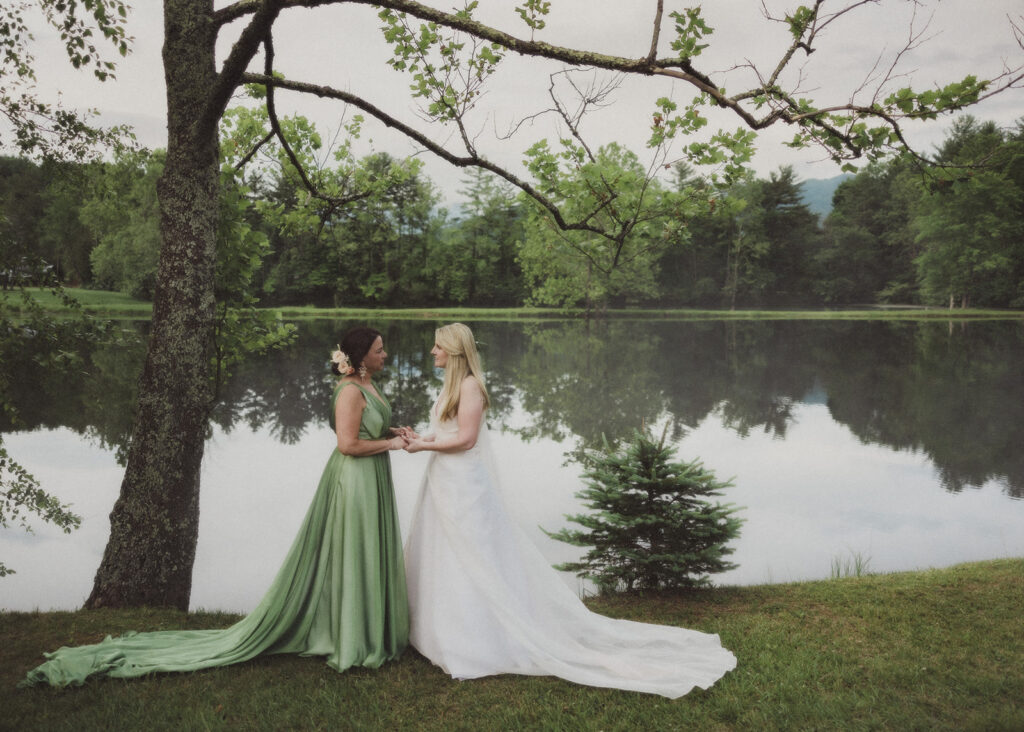 Two Brides Embrace at their wedding in Black Mountain North Carolina