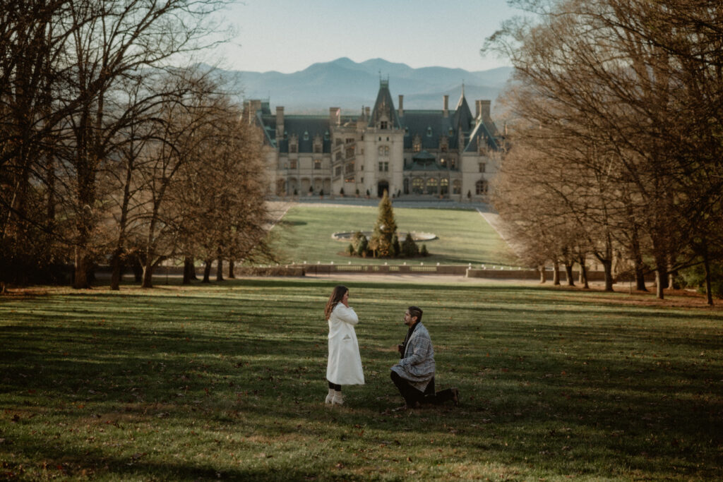 Man proposes to his girlfriend on the upper lawn at The Biltmore Estate - Asheville NC
