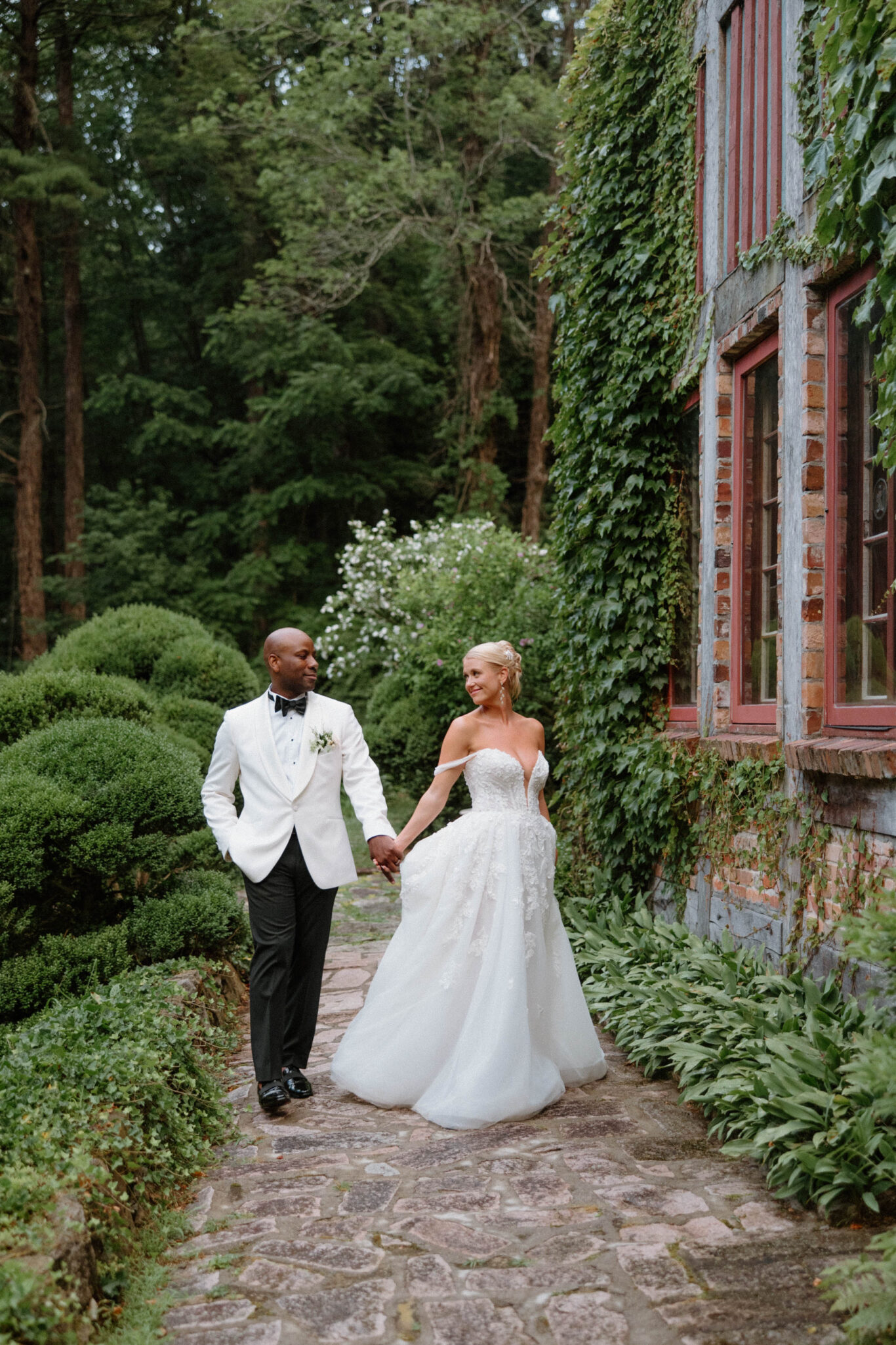 Couple Dances out side Douglas Ellington House on their wedding day