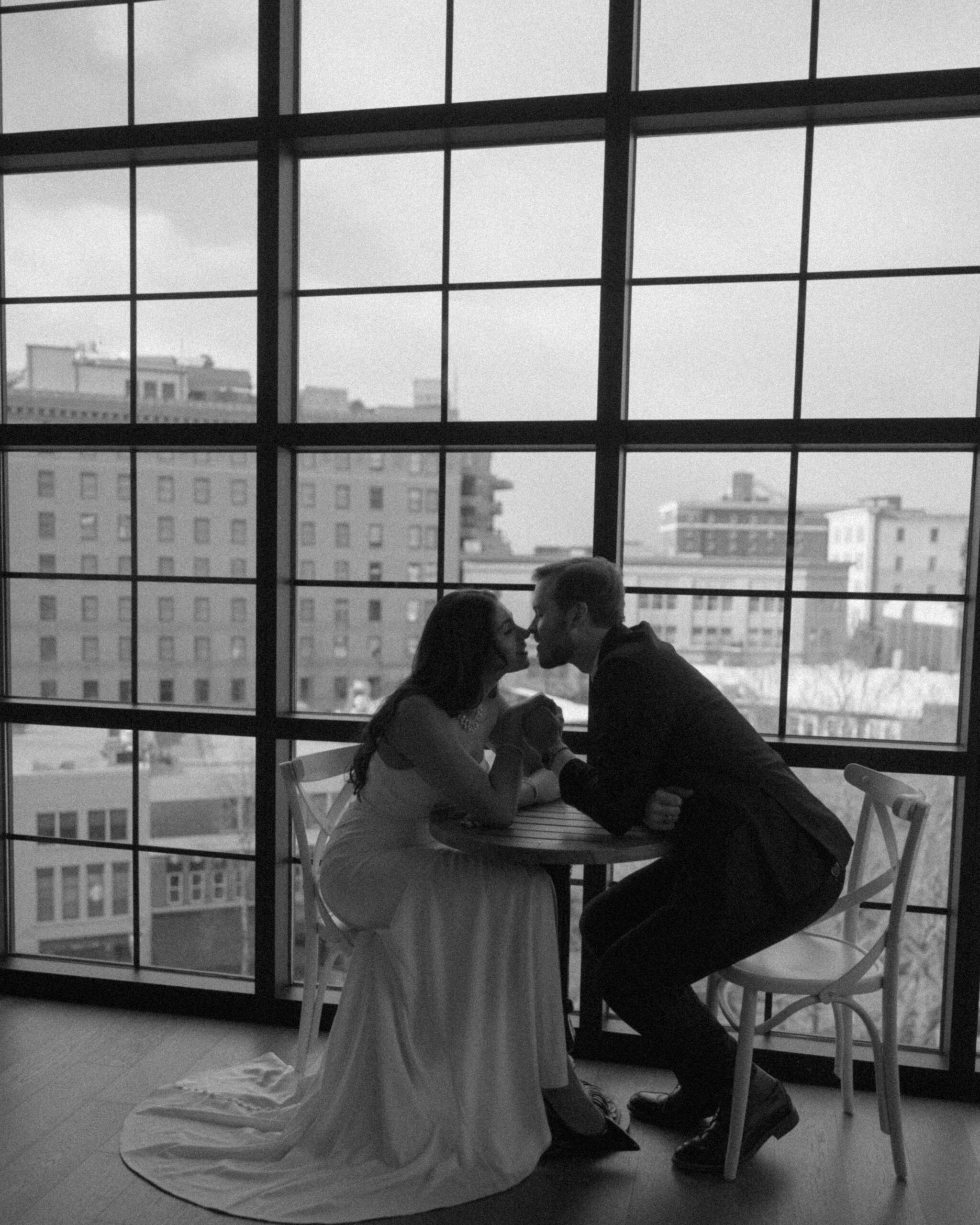 Bride and Groom overlooking downtown Asheville in Wedding Attire