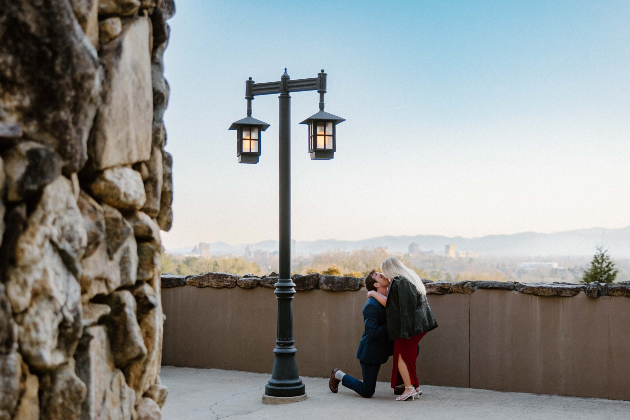 A private moment between a couple proposing at The Omni Grove Park Inn.