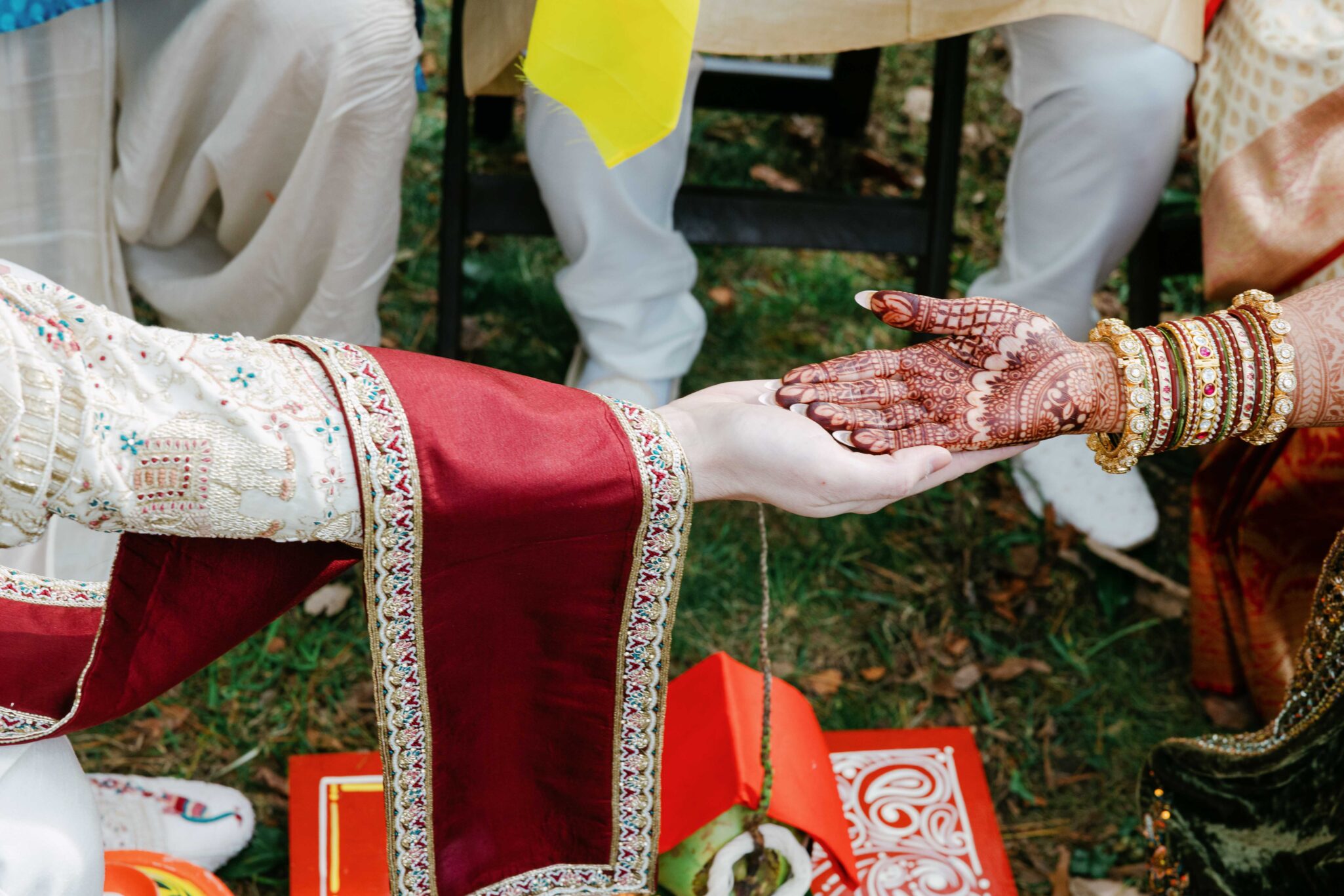 Hands, Baraat moment captured with documentary-style photography at the Douglas Ellington House.