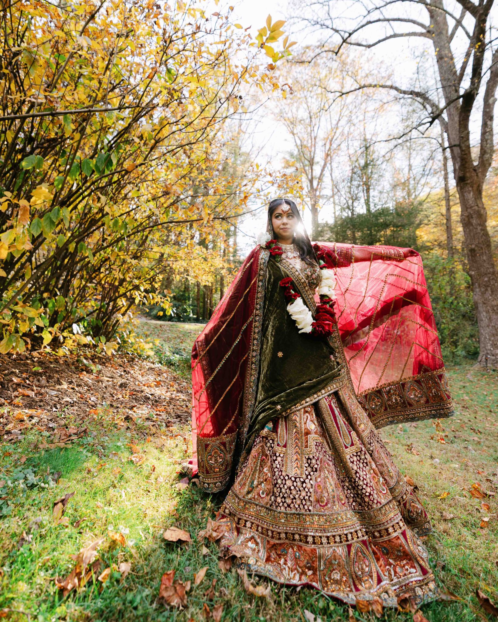 Bride in traditional Indian wedding attire photographed in natural spring light at the Douglas Ellington House.