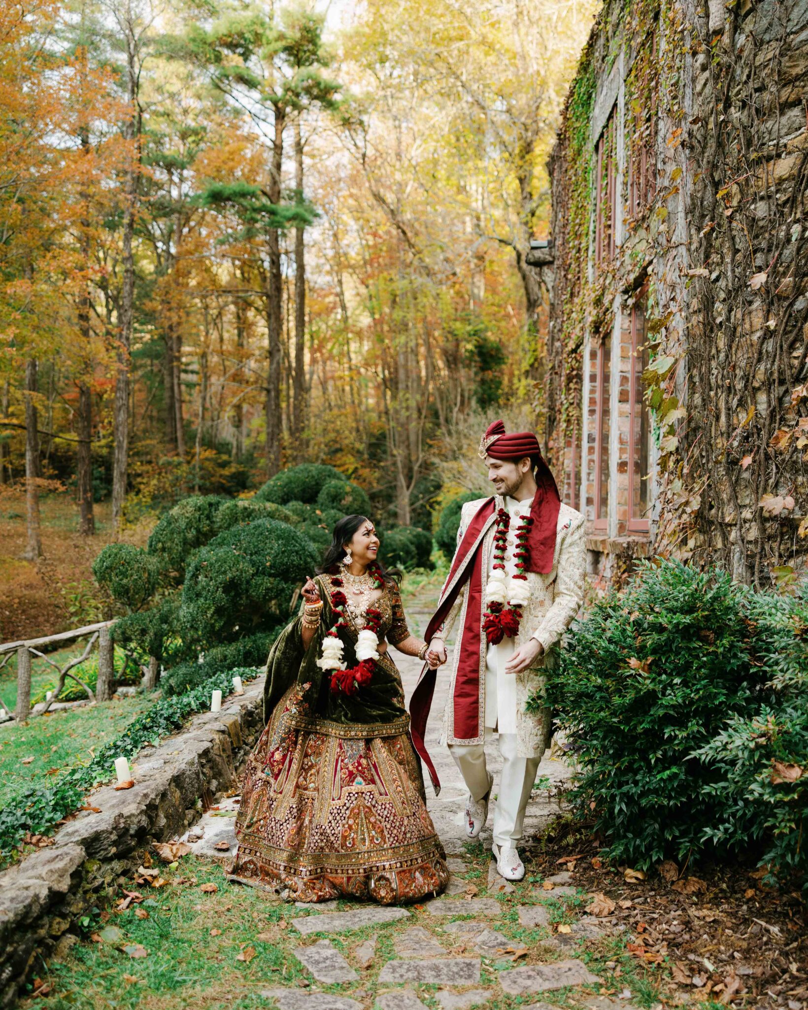 Bride and groom during their Indian wedding ceremony at the Douglas Ellington House in Asheville, photographed with vibrant and natural colors.