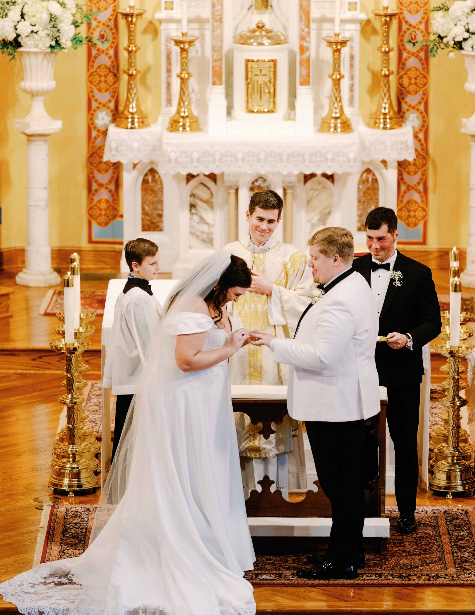 Bride and groom ceremony at Cathedral of St Patrick Charlotte