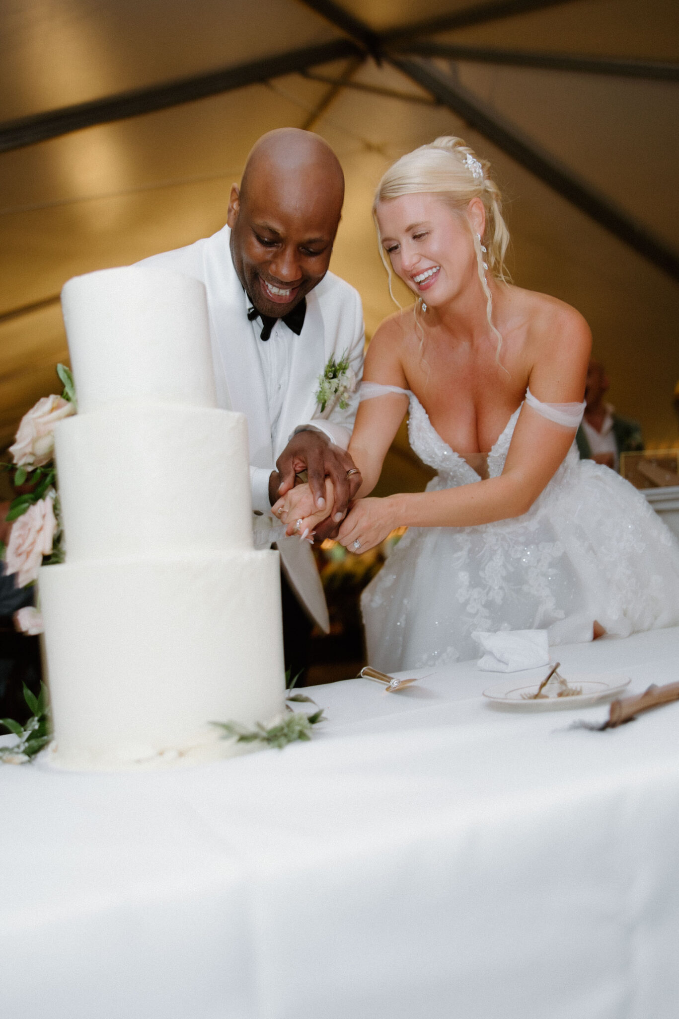 Bride and Groom cutting the wedding cake