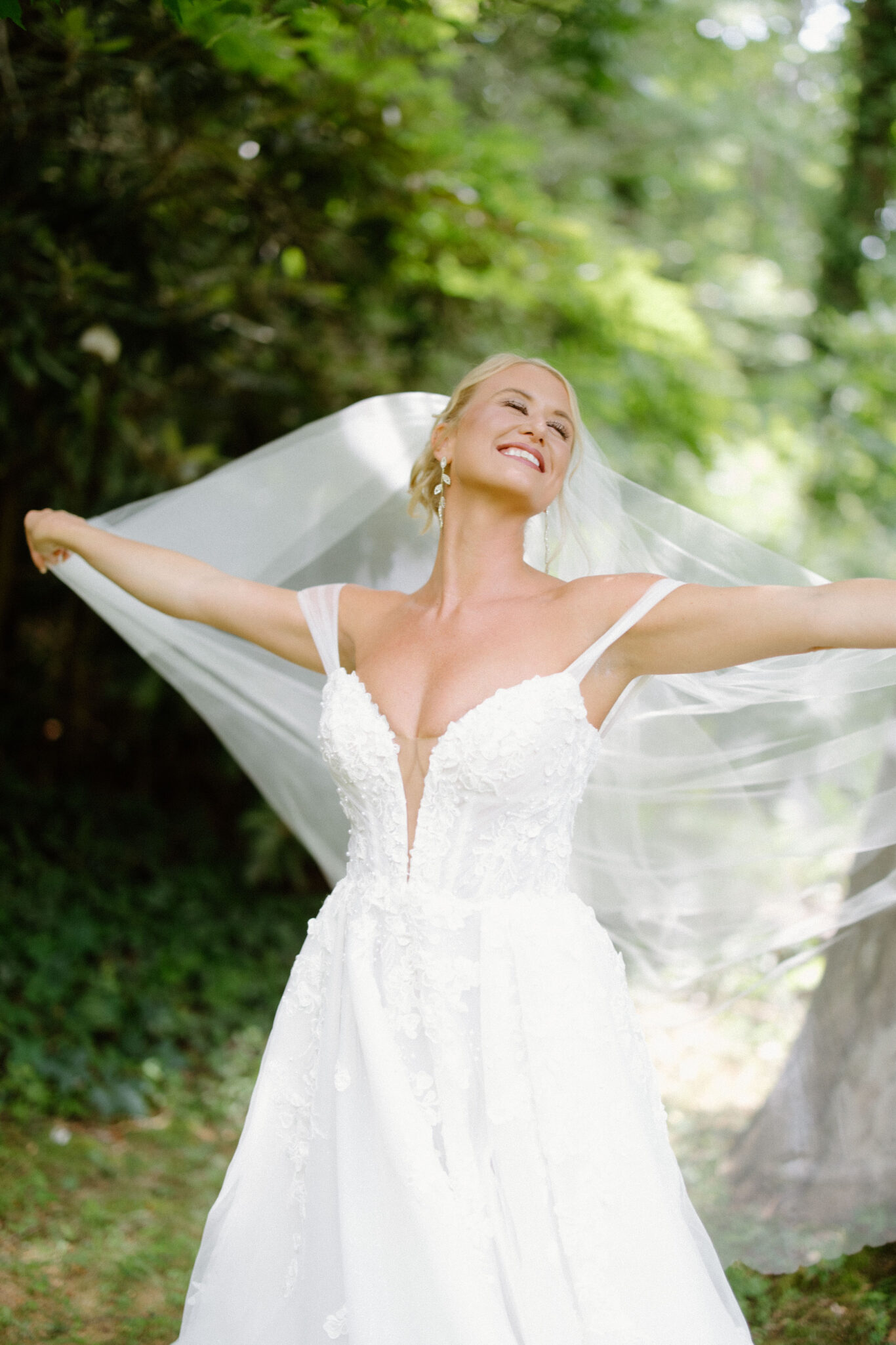 happy Bridal portraits outside in the greenery