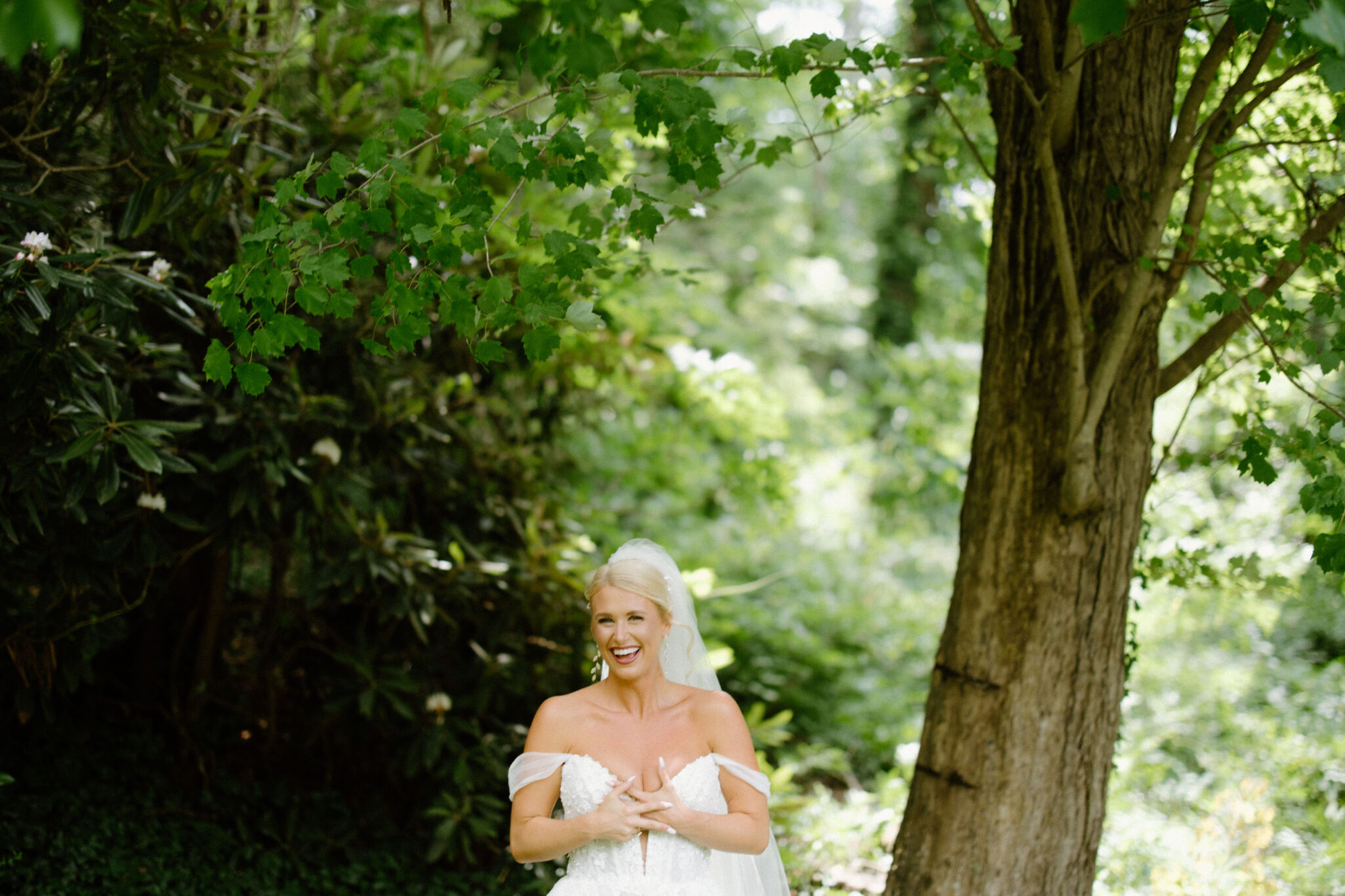 smiling Bridal portraits outside in the greenery