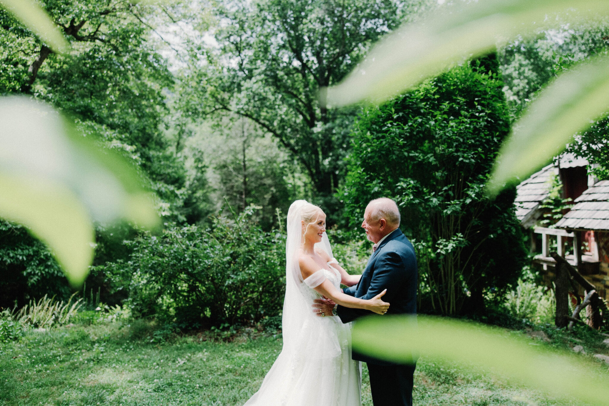 Bride first look with dad on wedding day at Douglas Ellington House Asheville