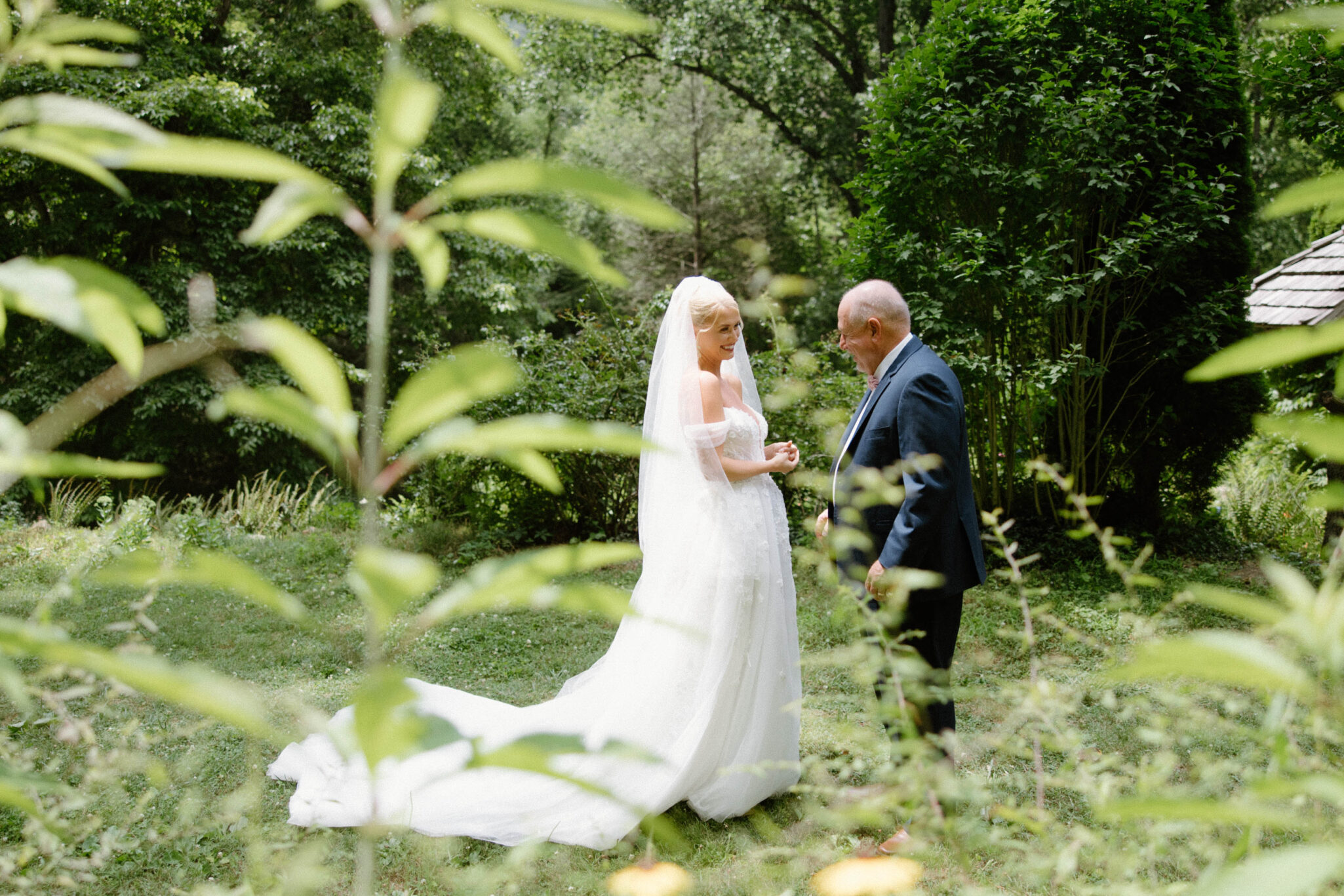 Bride first look with dad on wedding day at Douglas Ellington House Asheville