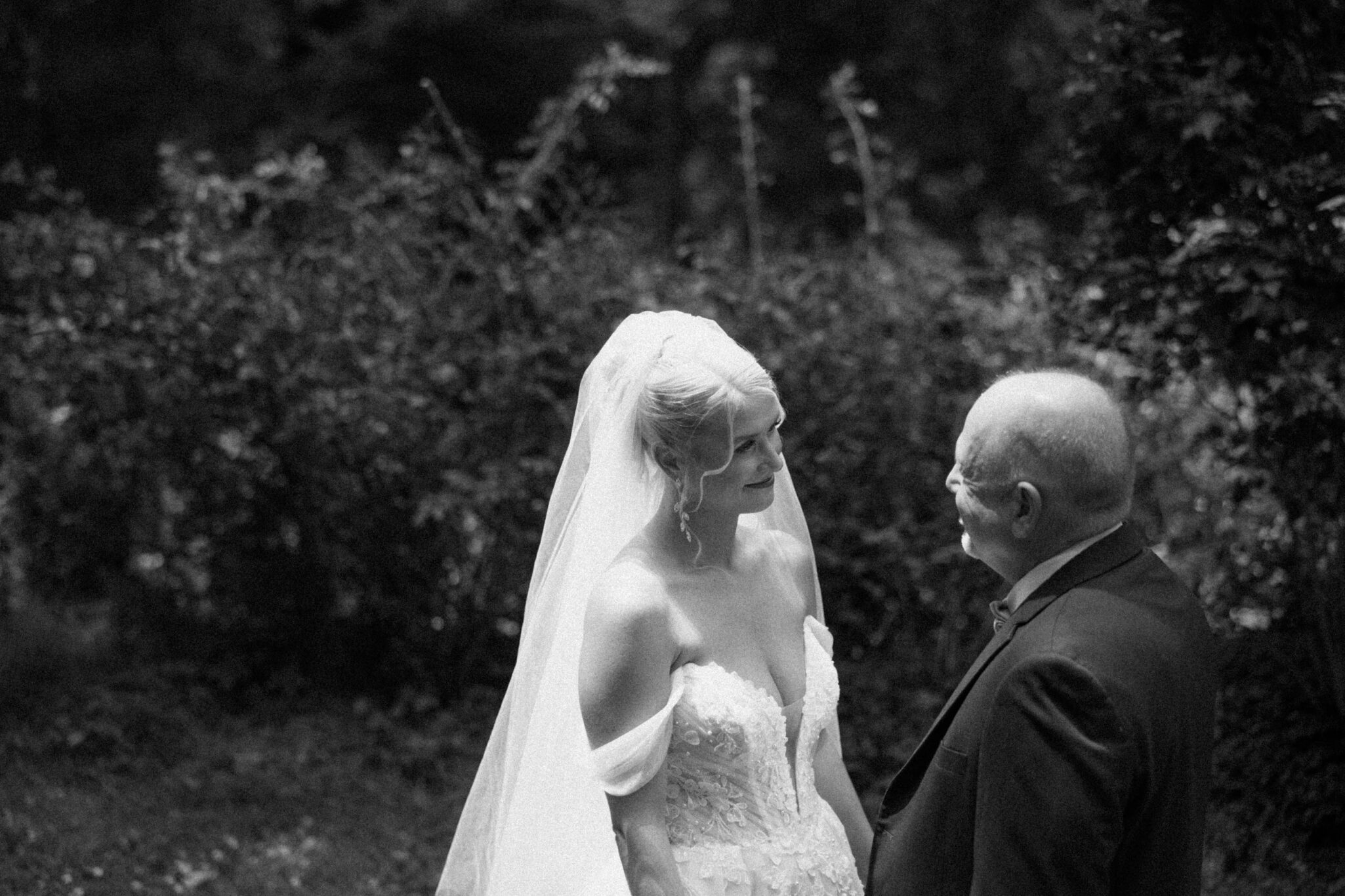 Bride first look with dad on wedding day at Douglas Ellington House Asheville