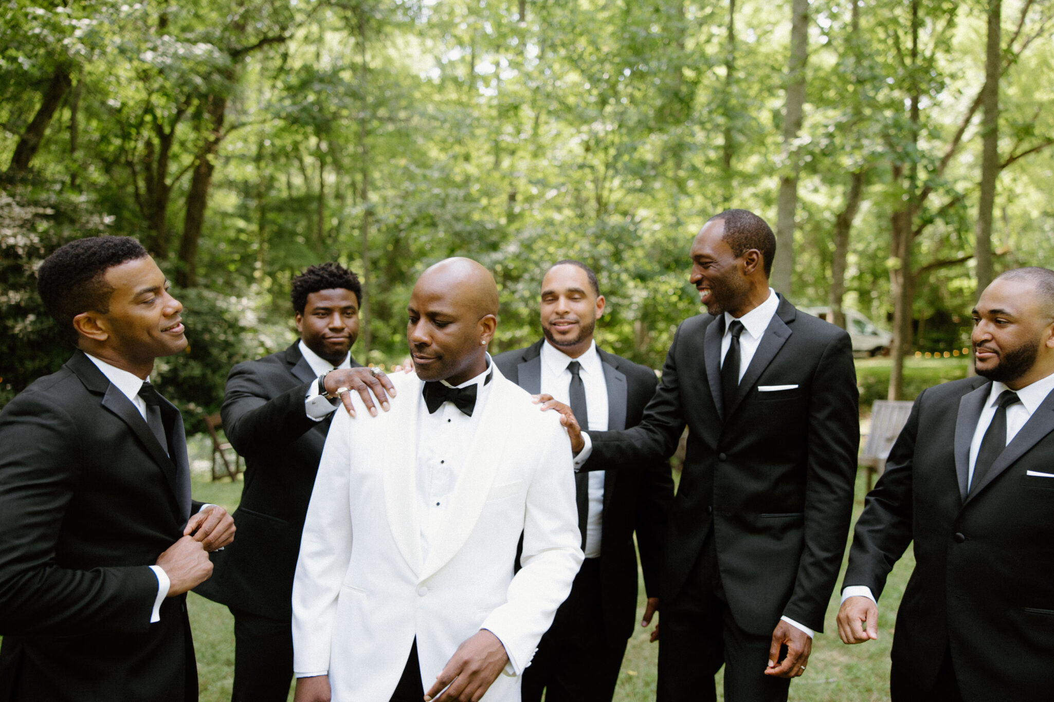 Groom and Groomsmen hanging out before wedding ceremony