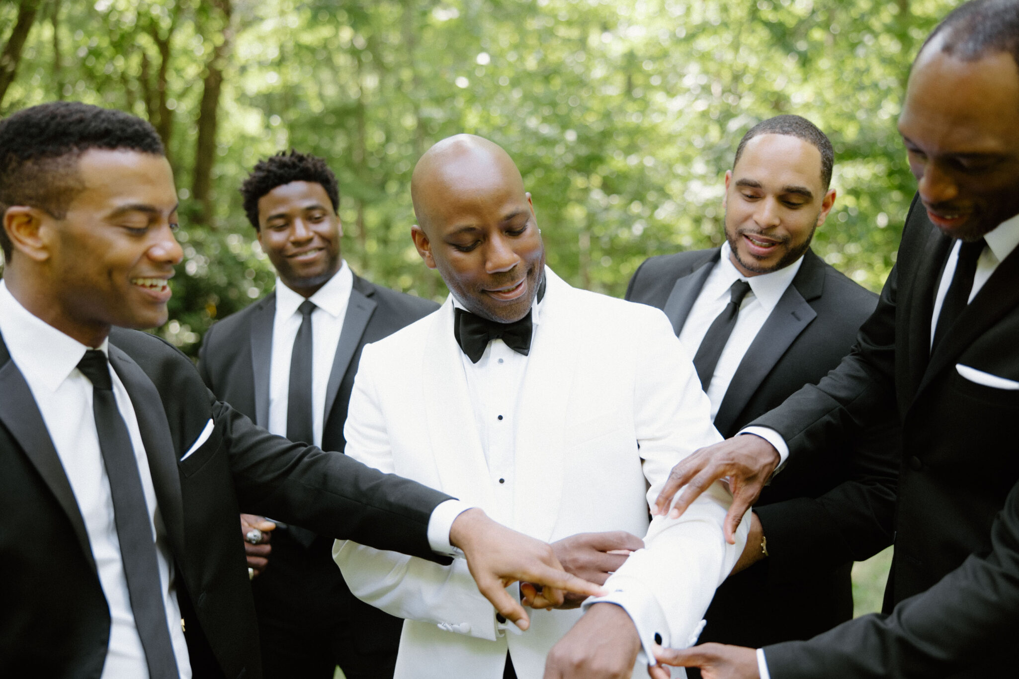 Groom and Groomsmen hanging out before wedding ceremony