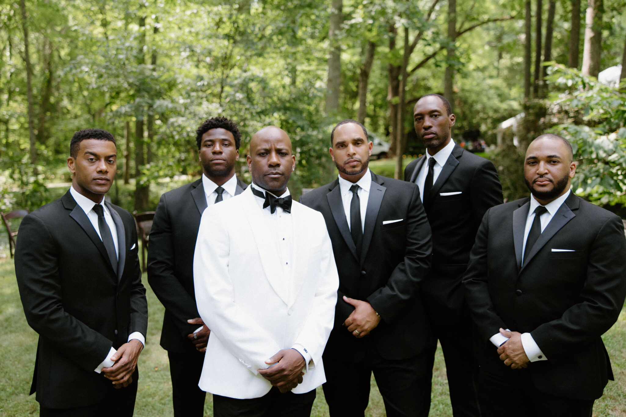 Groom and Groomsmen hanging out before wedding ceremony