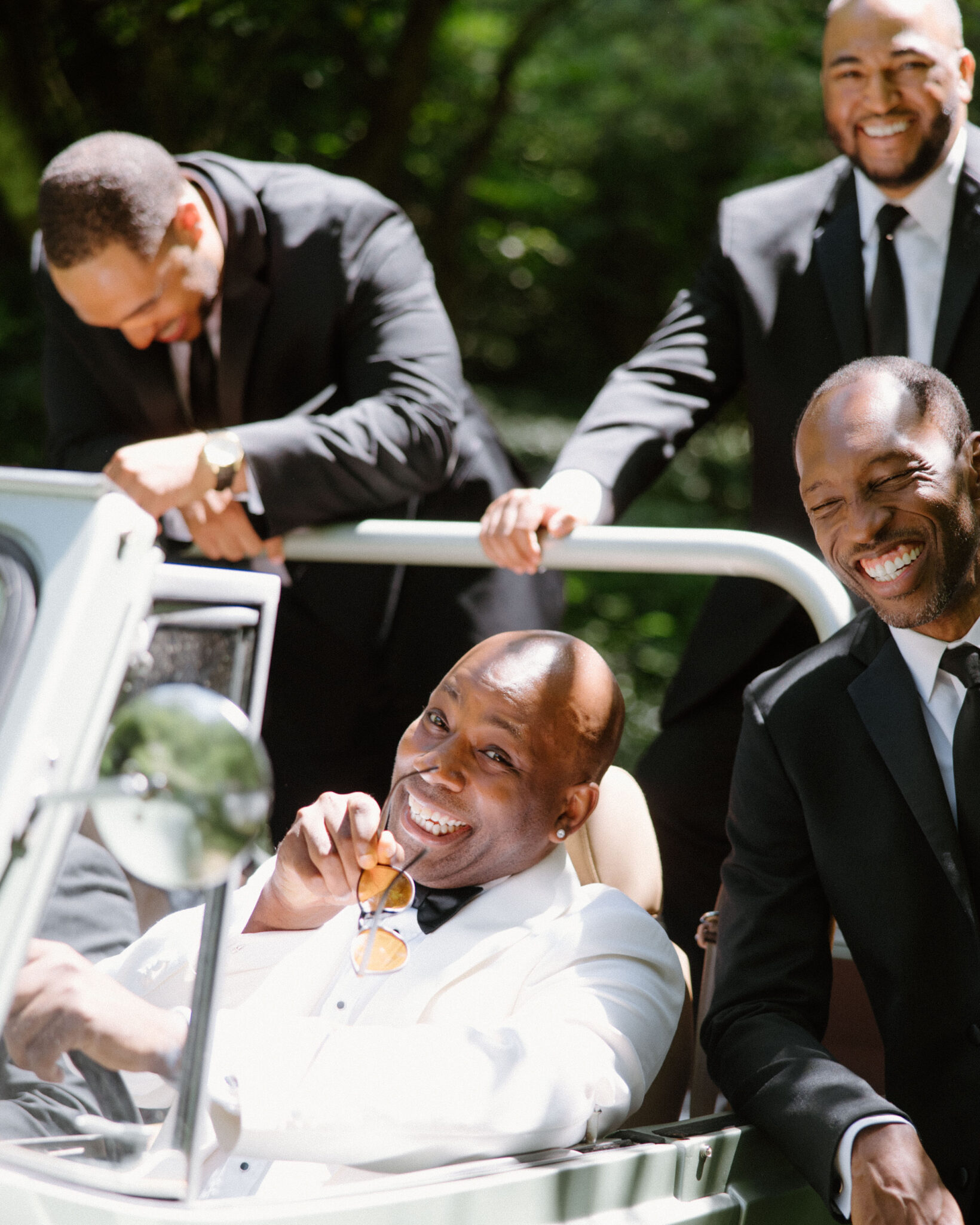 Groom and Groomsmen hanging out before wedding ceremony