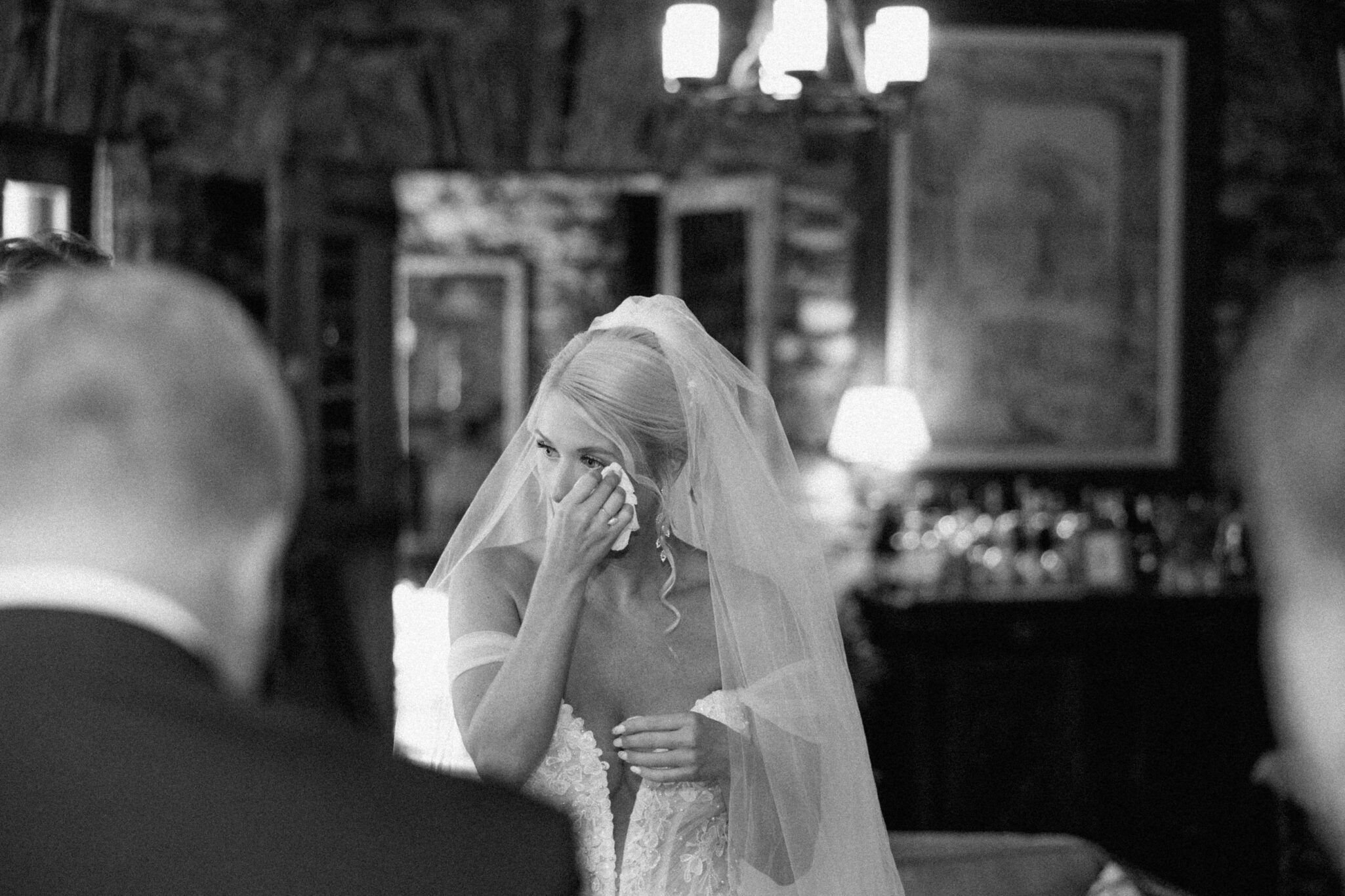 emotional bride with dad before wedding ceremony black and white