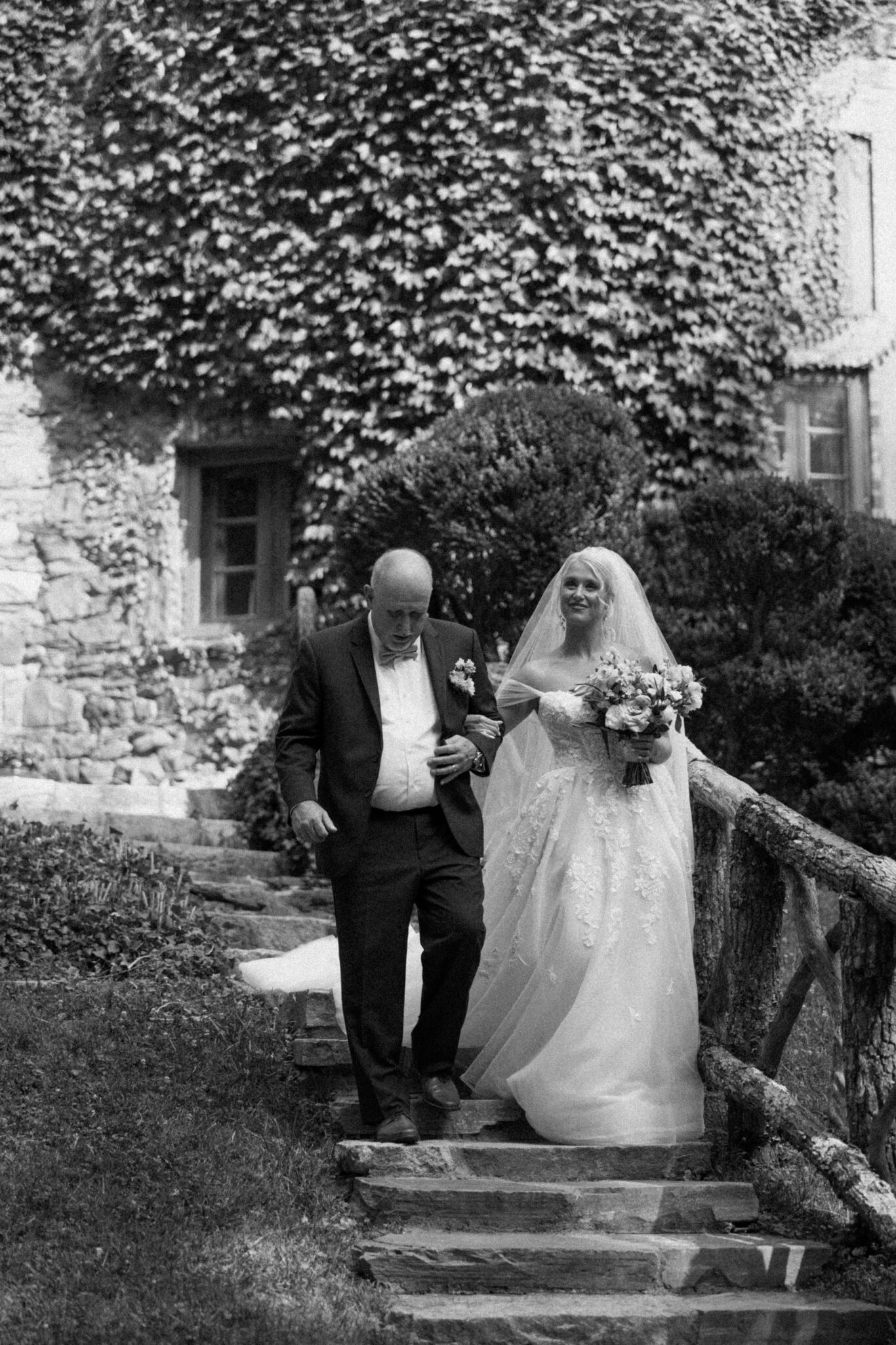 Bride walking down the isle with father at Douglas Ellington House