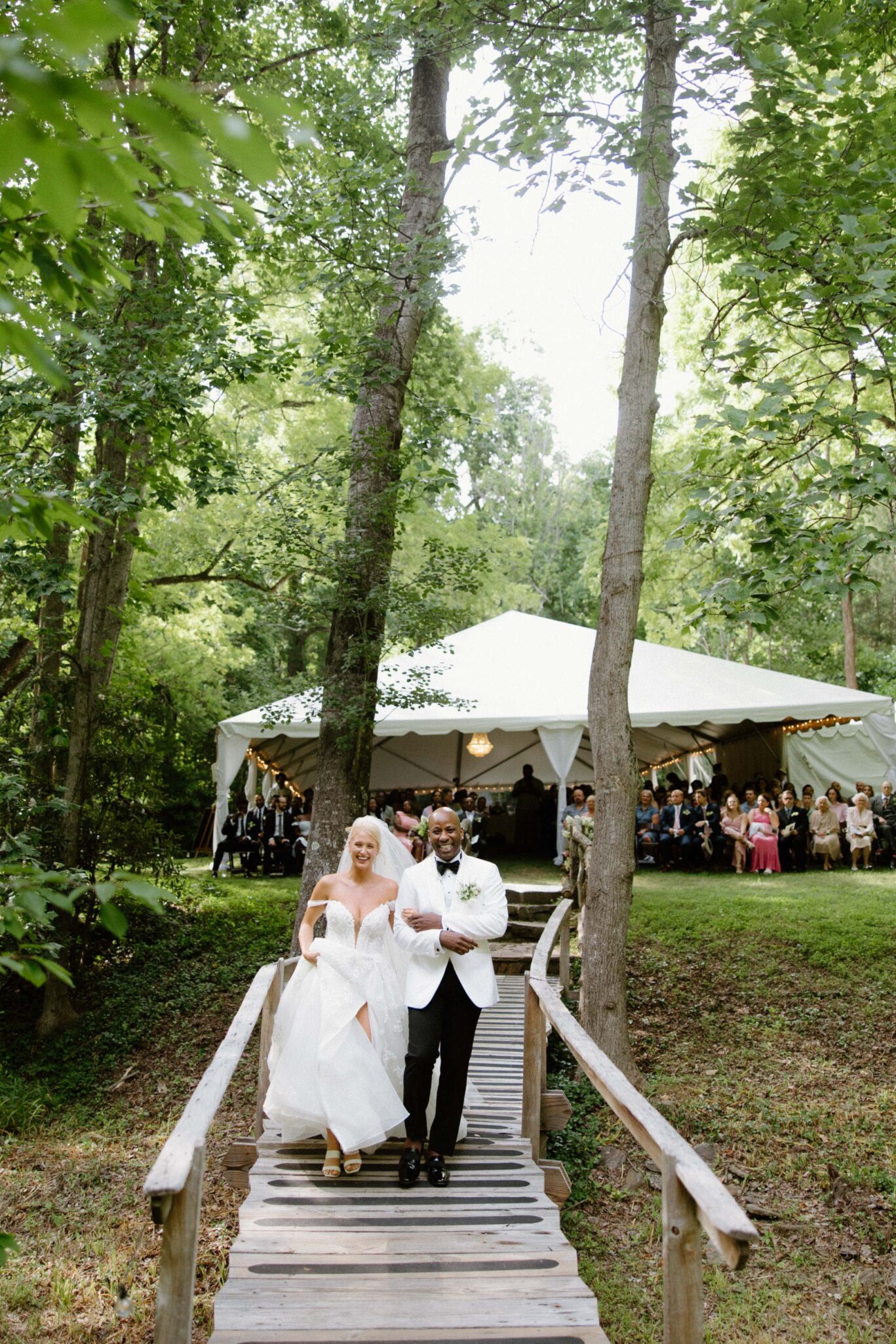 bride and groom just married reaction in front of Douglas Ellington House