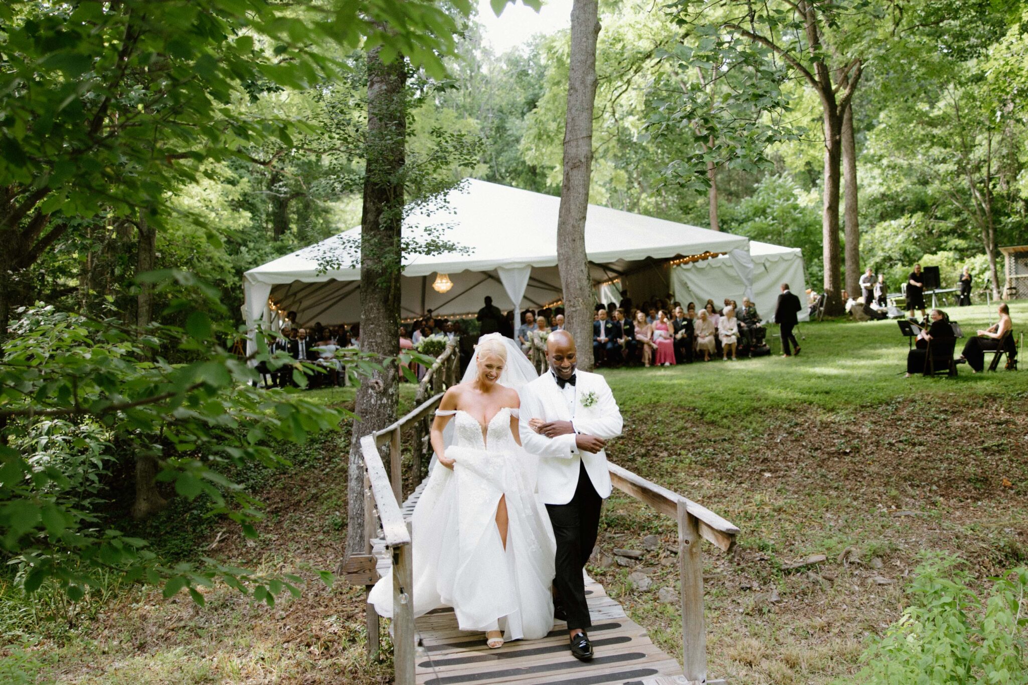 bride and groom just married reaction in front of Douglas Ellington House