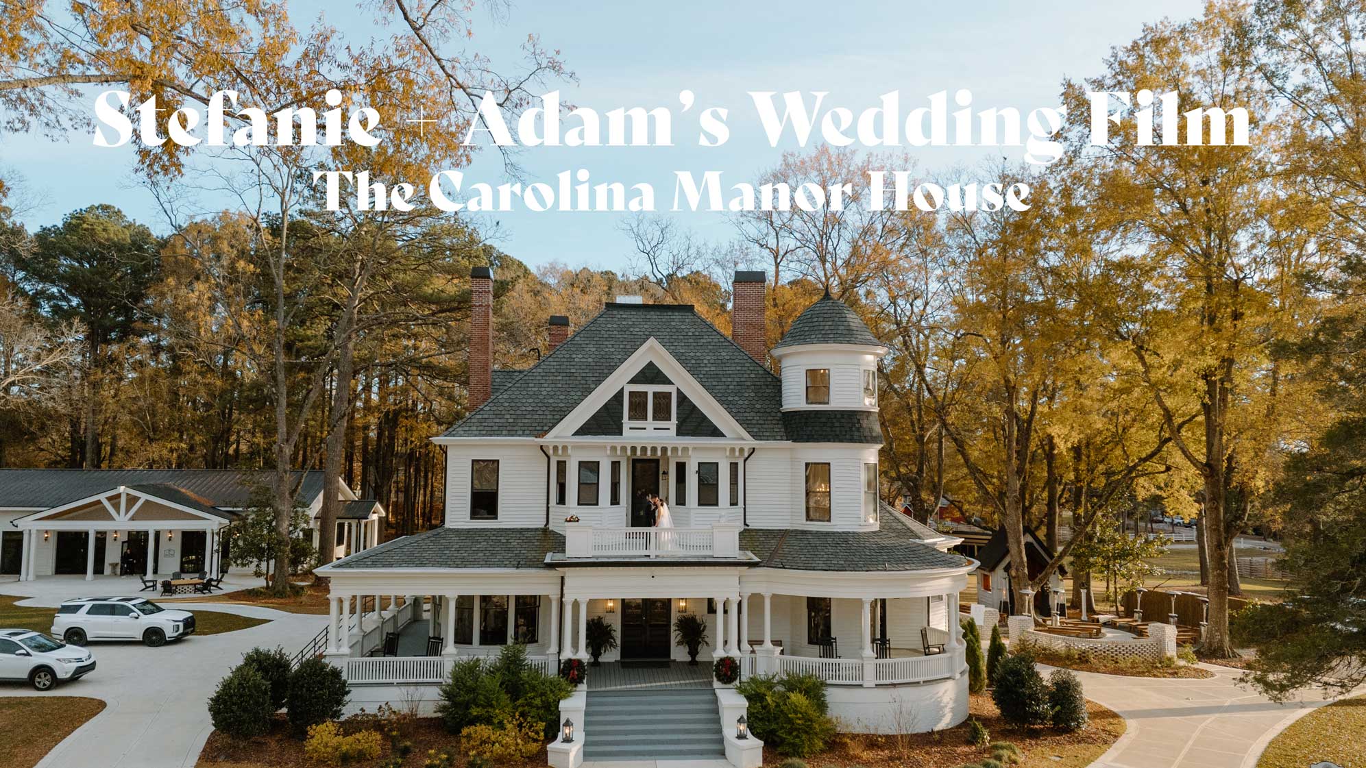 Exterior drone shot of historic wedding venue in North Carolina at the Carolina Manor House in fall.