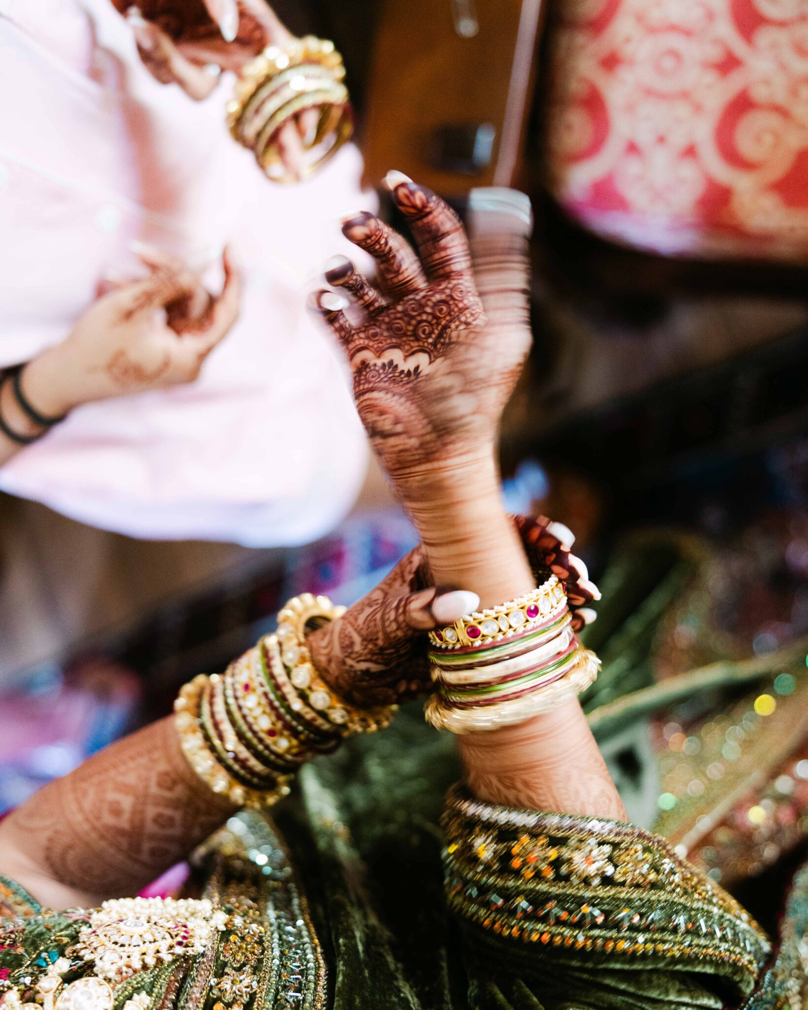 Indian Bride getting bracelets ready inside Douglas Ellington House, Asheville Wedding venue.