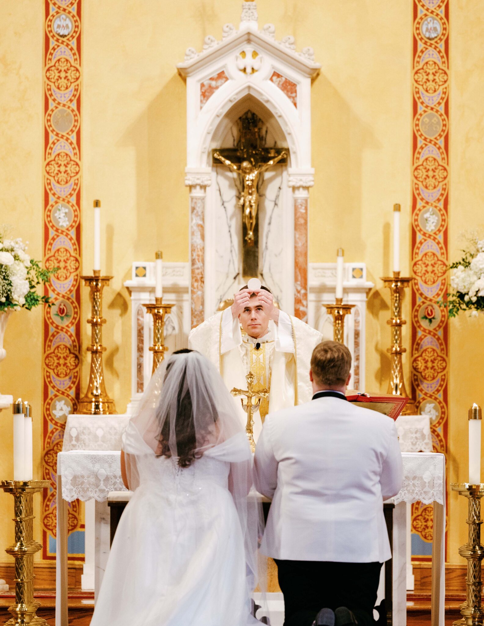 Bride and groom ceremony at Cathedral of St Patrick Charlotte