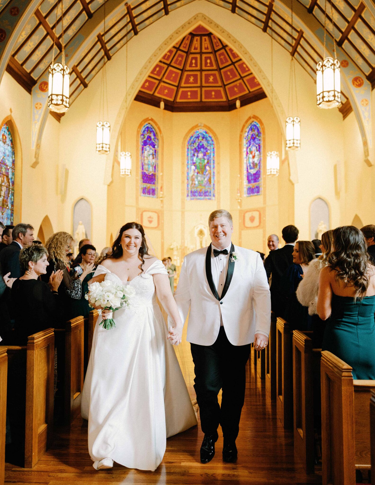 Bride and groom ceremony at Cathedral of St Patrick Charlotte